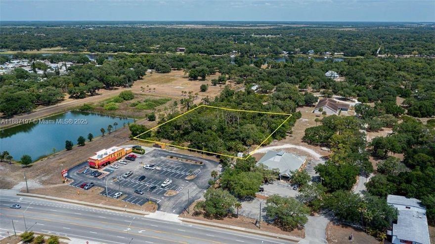 Seller says bring me an offer! 2.1 acre lot just north of Popeyes with 25' easement on east side of their parking for ingress. Survey of easemtent in file. Zoned B-2 for a mutlitude of uses with height restriction of 35'. The perfect place for your new business.