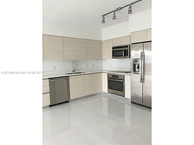 Recent building. 1 bed plus den unit @chic Baltus House! Top notch upgrades, including beautiful white porcelain tile flooring & finished closets. Awesome direct bay view as soon as you open the front door! Great amenities with a huge pool, deck, spa, barbecue area, and a rooftop lounge with an additional pool. Be part of the new "IT" neighborhood in the city. 5' walk to artsy, elegant, unique Design District, Art Basel front row. Privacy & location, the best!