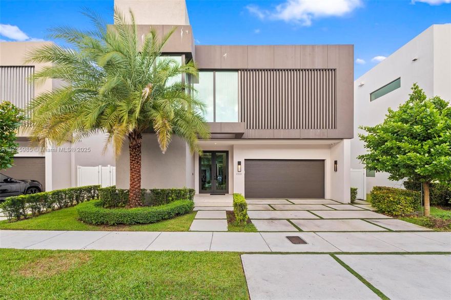 Discover this unique chance to own a stunning mansion with partial lake views in one of Doral's most prestigious neighborhoods. This home is part of the final collection built by the developer (Model S), featuring 5 bedrooms, 5.5 bathrooms, a private pool, and luxurious finishes throughout. Each bedroom boasts its own private bathroom, along with spacious closets and walk-in closets for added convenience. Situated on a strategically located lot, the property offers enhanced privacy and boasts sustainable living with an NGBS (National Green Building Standard) green certification.  
The Italian-designed kitchen and spacious layout make this home as functional as it is elegant. Additionally, this is a fully equipped smart home, blending modern convenience with unparalleled style.