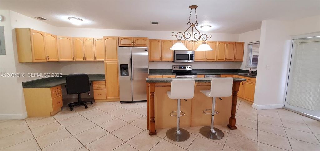 Photo of 1818 Rodman St #3H, Hollywood, FL 33020 (MLS # A12004918)