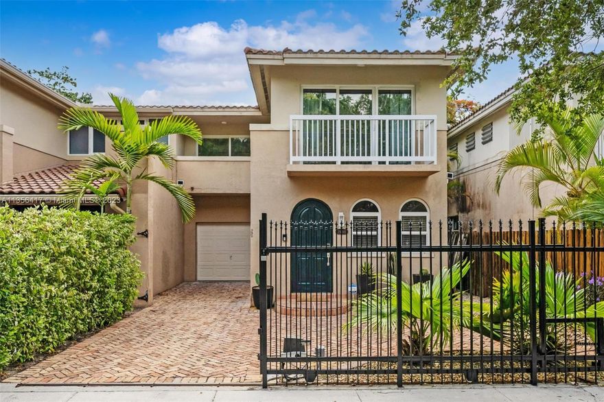 *** 1 year furnished rental. Spacious and impeccably maintained Center Grove 3 bedroom 2.5 bath gated townhouse. Updated bathrooms. All bedrooms upstairs, each with their own balcony. Primary bedroom comes with luxurious ensuite bathroom with soaking tub. Fully appointed kitchen with stainless steel appliances. 3 smart televisions. Impact glass windows and sliding doors throughout Fenced back garden with tropical landscaping. One car garage. Electric gate. Ring front door system. Yard service included. Turn key ready. Close to Grove Village Center, waterfront parks, restaurants and shopping.