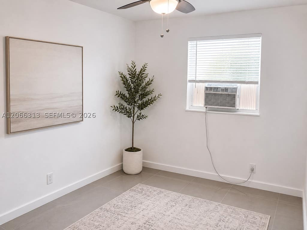 Photo of 309 Phippen Waiters Rd #2, Dania Beach, FL 33004 (MLS # A12066313)