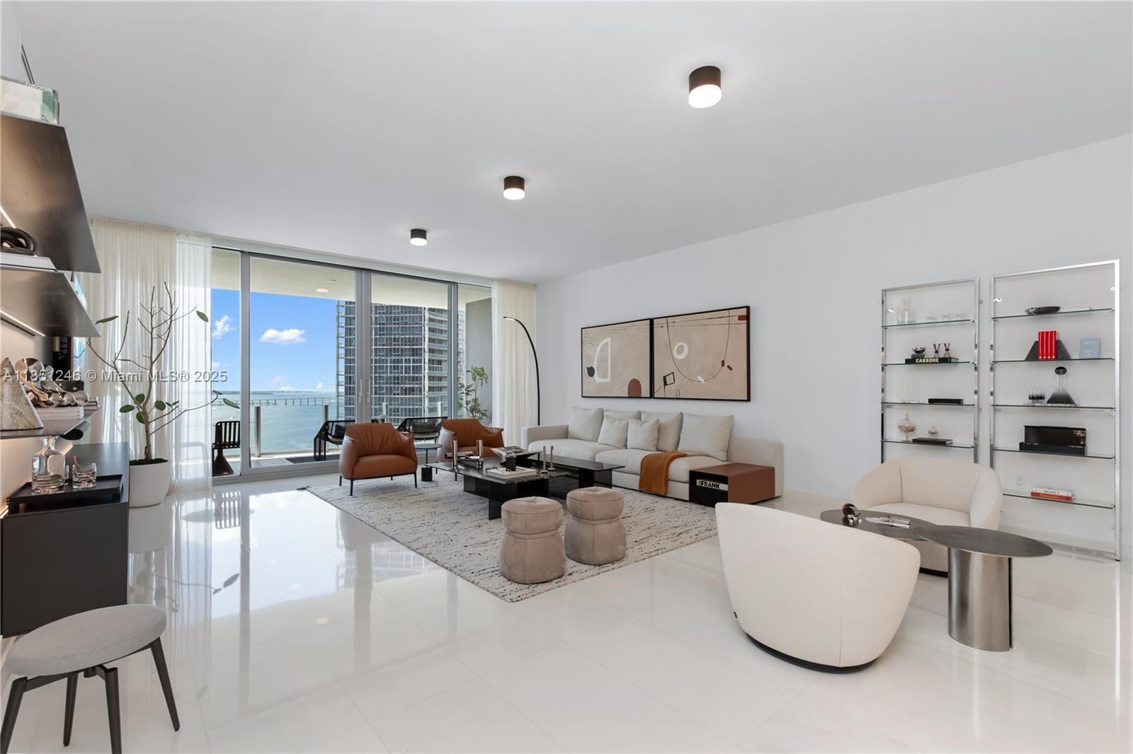 Welcome to Residence 2504 at the Aston Martin Residences—an impeccably furnished, design-forward 4-bedroom, 5.5-bath smart home with separate staff or guest quarters. Curated by SAGRAV Studio, this turnkey residence features panoramic water views, custom finishes, an integrated sound system, and full home automation. A rare opportunity to lease a thoughtfully appointed residence in one of Miami’s most iconic waterfront towers, offering world-class amenities and elevated living.