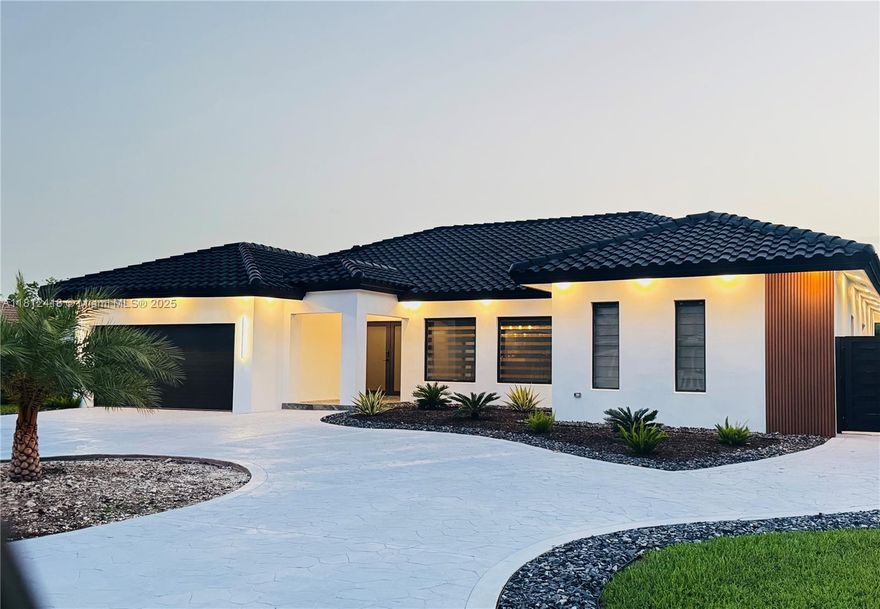 Luxury Miami Home with Modern Design, HIGH-END finishes in more than 0.4 Acres CORNER LOT. Open-concept layout with a NEW Built in 2025 modern Pool with SPA & Playita, Salt System. Exclusive neighborhood. Enjoy a masterpiece European-Styled custom Kitchen, Brand New Top-of-the-line Appliances, 2025 Impact Windows & Doors. New Aluminum Fence, Custom Interior Doors with magnetic integral locks. ALL NEW & fully remodeled bathrooms. One level house with 40x40 European porcelain tile. Tankless water-heater & top of the line AC system w/ modern AC lineal vents. Enjoy a new pool deck with a big entertainment area. IMPACT MODERN GARAGE DOOR with side motor. Enjoy the Miami Lifestyle in this huge patio where you can fit any size boat, RV, SXS or all together. NO HOA, Owner Agent. Easy to show.