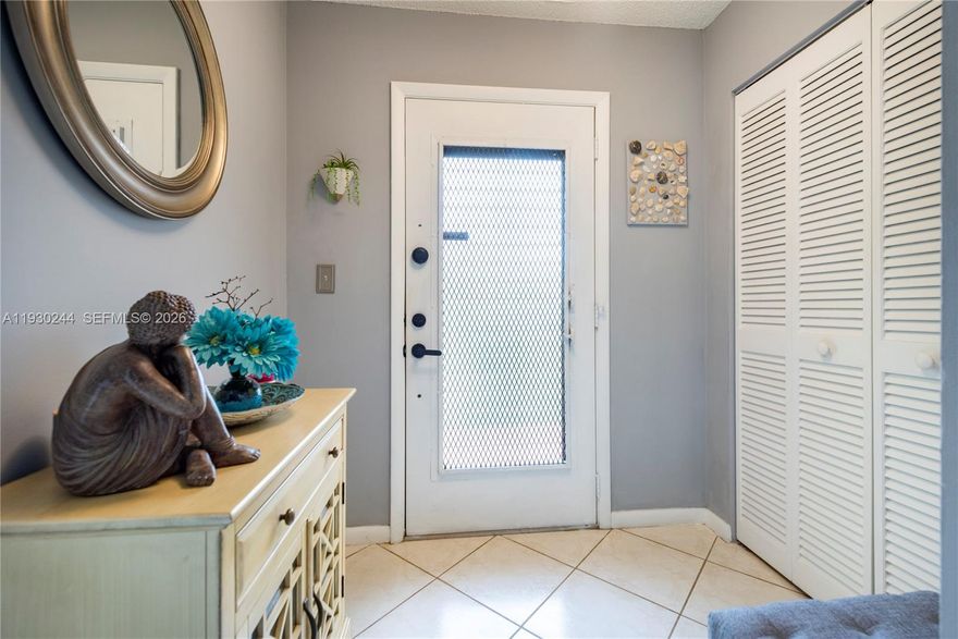 MOTIVATED SELLER!!!!!  ----- SELLER TO PAY 3 MONTHS OF THE ASSOCIATION FEE FOR THE BUYER, Beautifully furnished, fourth floor CORNER condo. TURN KEY spacious 2/2 offers over 1200 sq ft of living space. Located in the highly sought after community of Lakes of Carriage Hills. Bright & open impeccably kept. Updated throughout with gorgeous wood flooring. Two large separated bedrooms with spacious walk in closets, large separate laundry room with full size washer & dryer and extra storage. Screened and tiled patio with hurricane shutters. Enjoy strolls on the walking paths & bridges throughout this maintained 55+ community. ASSESSMENTS HAVE BEEN PAID - Clubhouse activities, 2 heated pools, tennis courts, shuffleboard & much more just steps from your front door. Cable, internet & water arE included in the assoc fee.