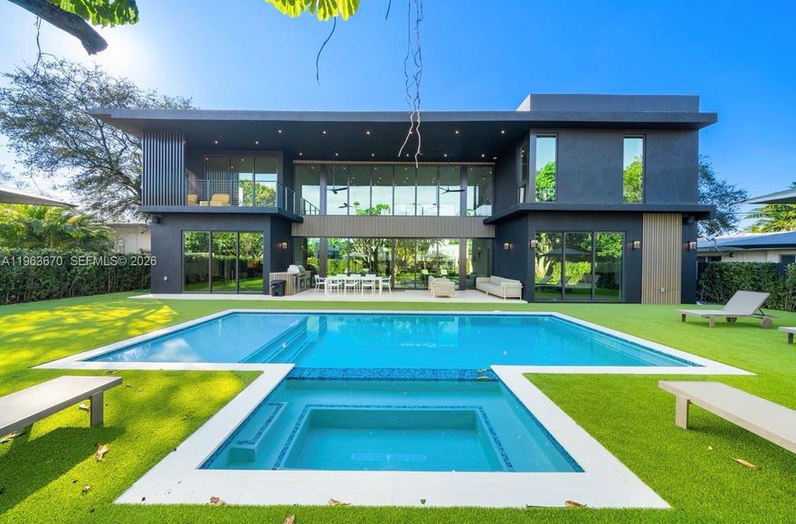 A brand-new, modern masterpiece featuring eight spacious bedrooms, each with its
own luxurious en-suite bathroom. The home boasts soaring high ceilings, sleek modern décor,
and an abundance of natural light. Outside, there's a generous backyard with a stunning pool
and a large spa, perfect for relaxation. Plus, there's even a ping-pong table for some fun and
games. With plenty of space both inside and out, this home is the epitome of modern luxury and
comfort.