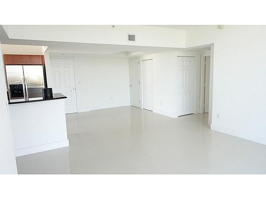 CORNER UNIT - BAY & CITY VIEWS -TWO PARKING SPACES - STORAGE UNIT - HIGH CEILINGS - 19TH FLOOR - WHITE PORECLAIN FLOORS THROUGH OUT - SPLIT FLOOR PLAN -  TOP OF THE LINE STAINLESS STEEL APPLIANCES - GRANITE COUNTER TOPS - TRAVERTINE BATHROOMS - WATER, CAB LE AND INTERNET INCLUDED. Walking distance to Coral Gables Downtown Miracle mile, restaurants and shopping stores.