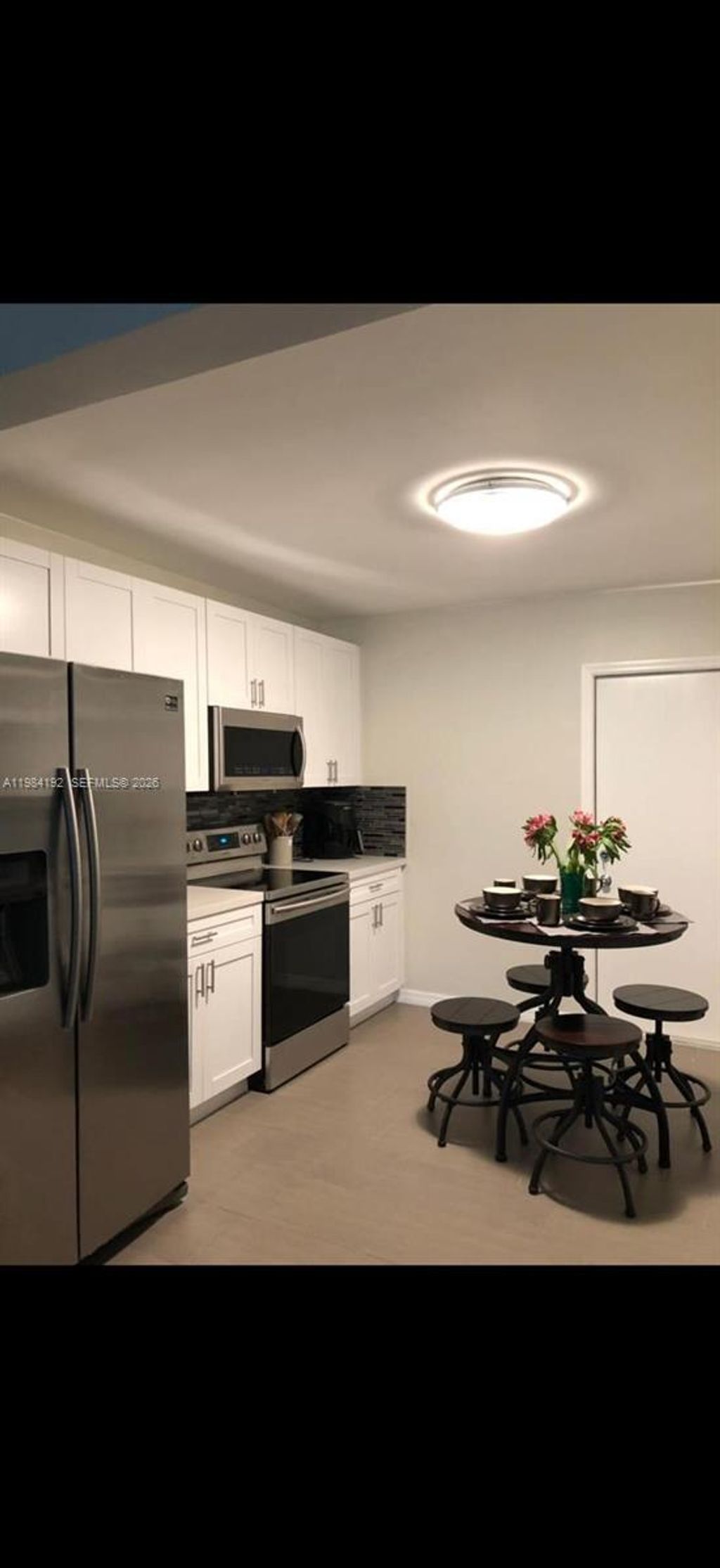 Photo of 1432 NE 5th Ave #1, Fort Lauderdale, FL 33304 (MLS # A11984192)