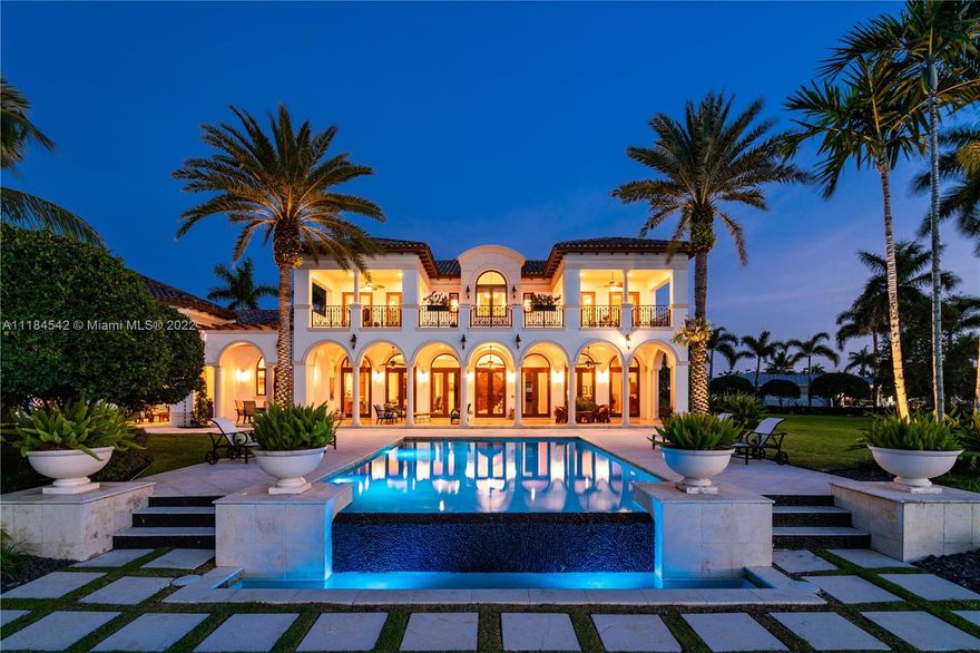 The crown jewel of E-Lake is now available. Situated on ¾ acre & surrounded by water, this private, 2010 Ramon Pacheco designed estate is a tribute to tasteful Mediterranean architecture. Sought after E-Lake has always offered the opportunity to enjoy waterfront activities that include boating, waterskiing & fishing. This residence, with its own 20’ dock and private beach, takes it to the next level. Open terraces encourage outdoor entertaining as does the summer kitchen, all overlooking the enticing infinity pool. The attention to detail is reflected in the estate’s craftsmanship. The beautiful Fairchild-worthy grounds offer peace & serenity. The 3-car finished garage, generator and impact glass add easy living to a property filled with style & grace. Paradise found! A Very Special Home.