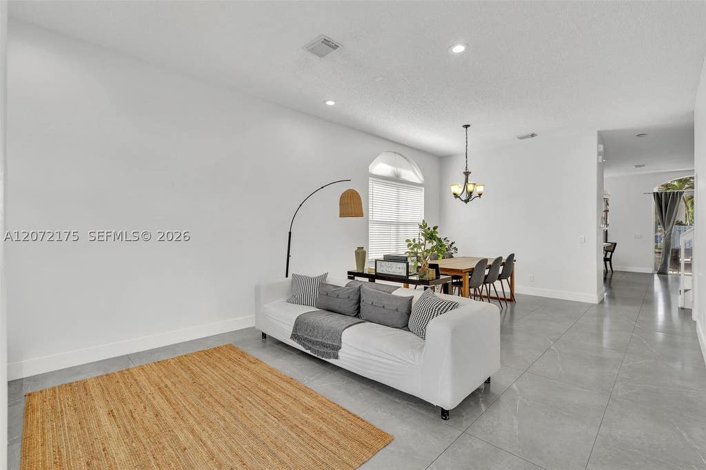 Photo of 7654 NW 21st Dr, Pembroke Pines, FL 33024 (MLS # A12072175)