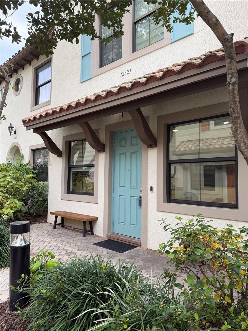 Photo of 12621 NW 32nd Pl, Sunrise, FL 33323 (MLS # A11960711)