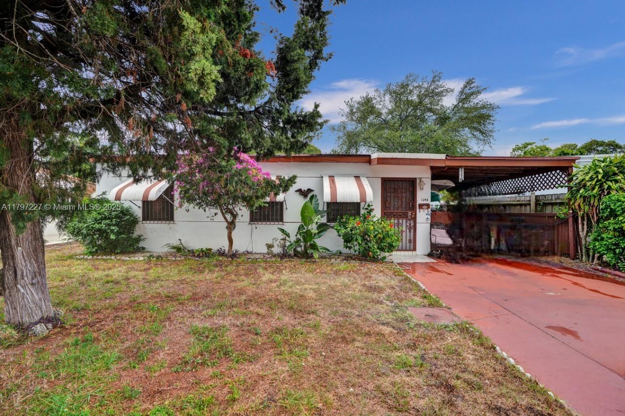 Welcome to this inviting 2-bedroom, 1-bathroom home that’s perfect for a small family looking for comfort, charm, and functional space. The open-concept living and dining area features warm wood-style flooring. The home’s layout offers seamless flow from the living area to a cozy dining nook and into a screened-in back patio and offers generator hook up. Enjoy the convenience of nearby schools, parks, shopping centers, and easy access to major highways. Ideal for first-time buyers or as an investment property! Property is being sold AS IS. Motivated Seller!