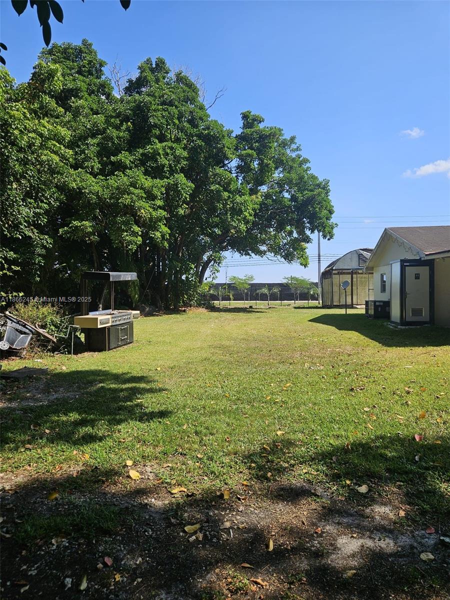 Rare opportunity: 2.71 acres—the only undivided lot on the block, with entrances from SW 214th St and SW 216th St. Endless potential to subdivide, develop, or hold as a valuable long-term asset in a fast-growing area. Beyond the investment, enjoy a move-in ready 3-bed, 2-bath home featuring an open-concept living area with abundant natural light, a modern kitchen with stainless steel appliances, and spacious bedrooms designed for comfort. Step outside to a private backyard oasis, perfect for family gatherings, barbecues, gardening, or simply relaxing. This is more than a home—it’s a rare chance to secure comfort today and unmatched growth for tomorrow. Opportunities like this are one of a kind—don’t wait, act fast!