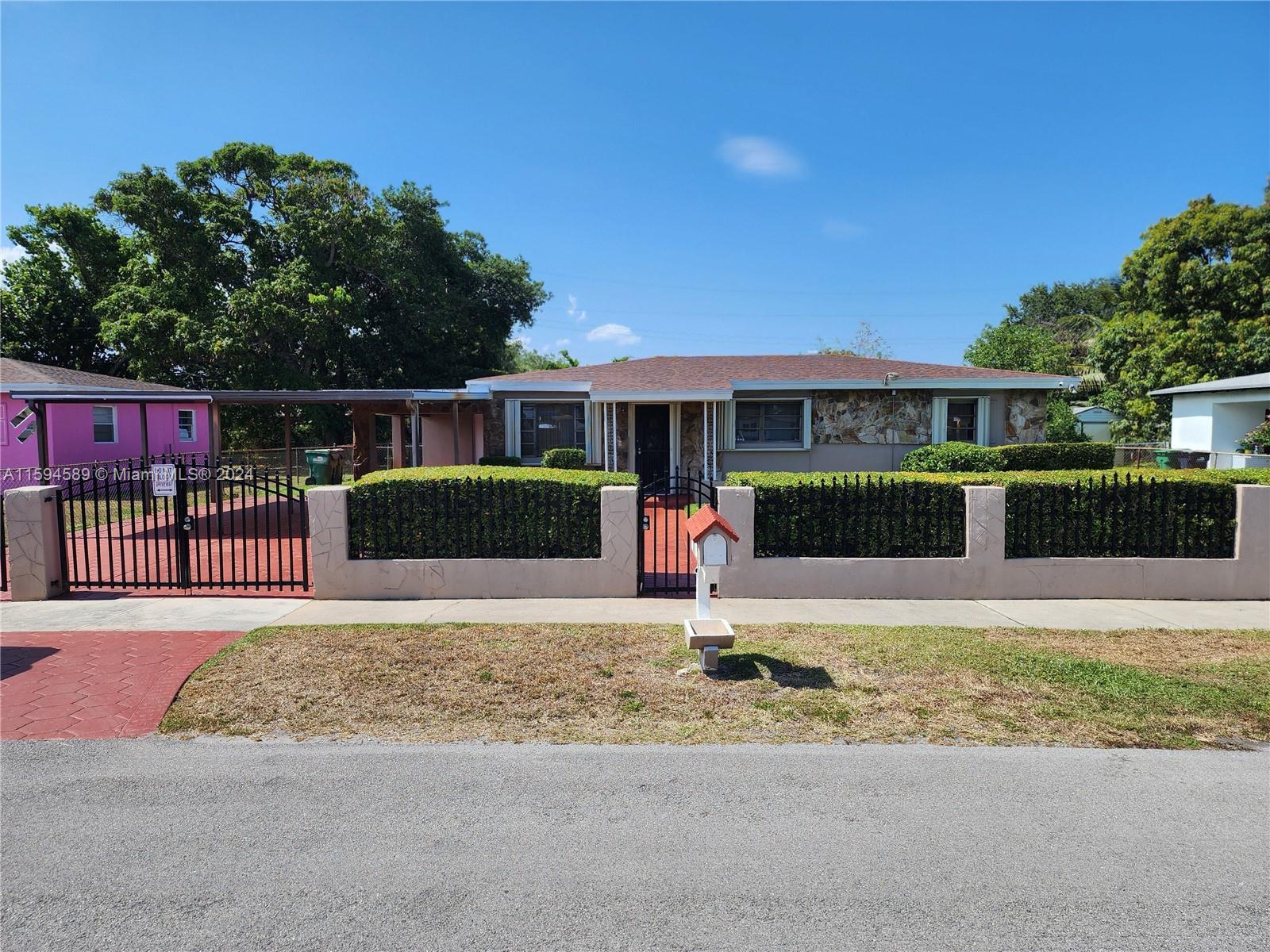 Beautiful 3 bedroom 2 bath family home with new central air that's move in ready. Gated front yard with stamped concrete front walkway and 3 car carport. New roof, spacious fenced-in back yard with screened back patio. Master bedroom (carpeted) with ceiling fan and connecting master bathroom with walk in shower. 2 guest bedrooms (carpeted) and 1 guest bathroom with tub/shower. Nice large family room with recess lighting, Living room with ceiling fan, dining area with nice hanging chandelier adjacent to family kitchen with stove/oven and refrigerator. There is also a storage/laundry room with washer and dryer.