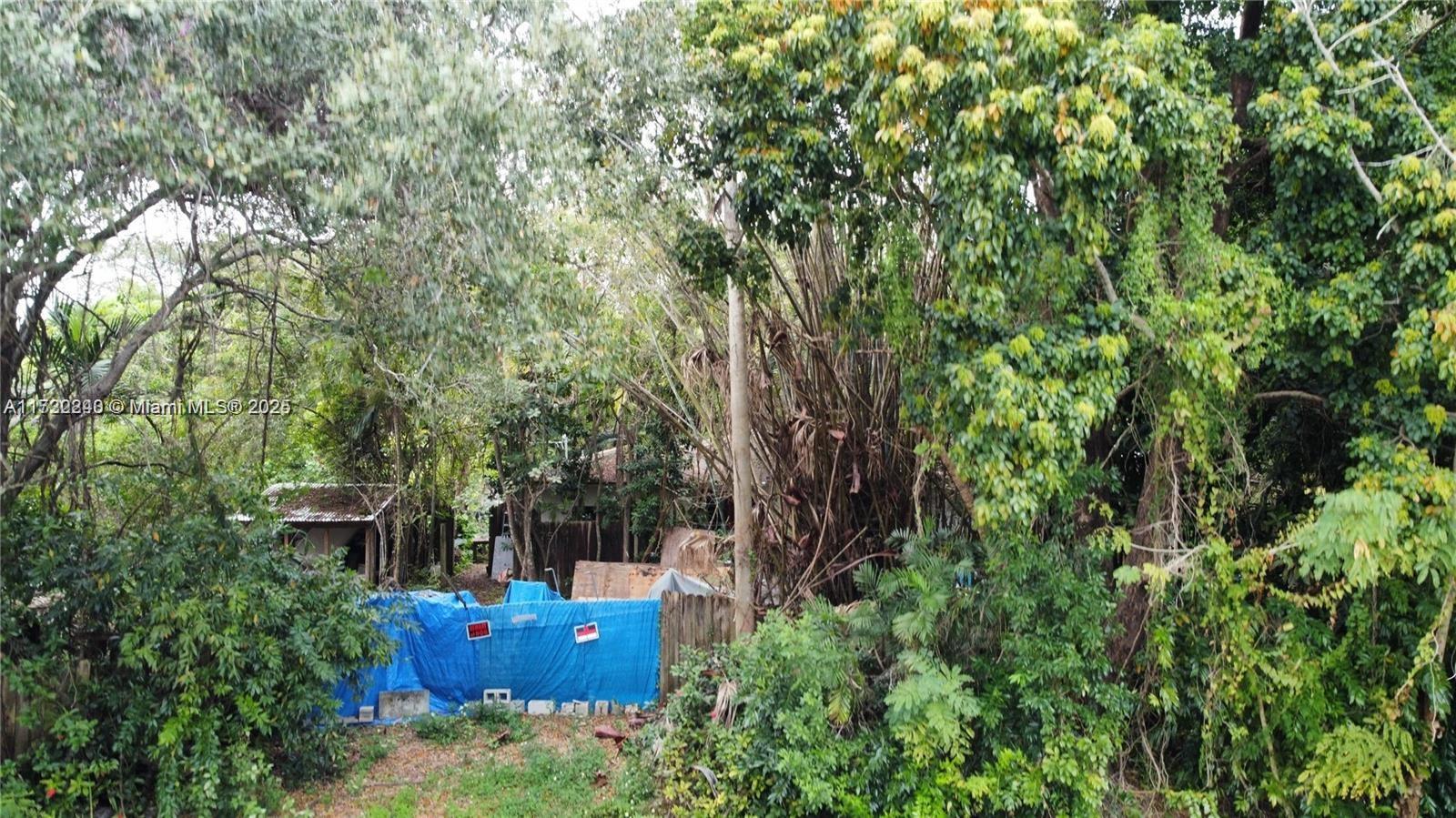 Teardown home right on SW 112 ST ready to build with plans approved, except for recorded plat which is currently in the process. See attached pictures.