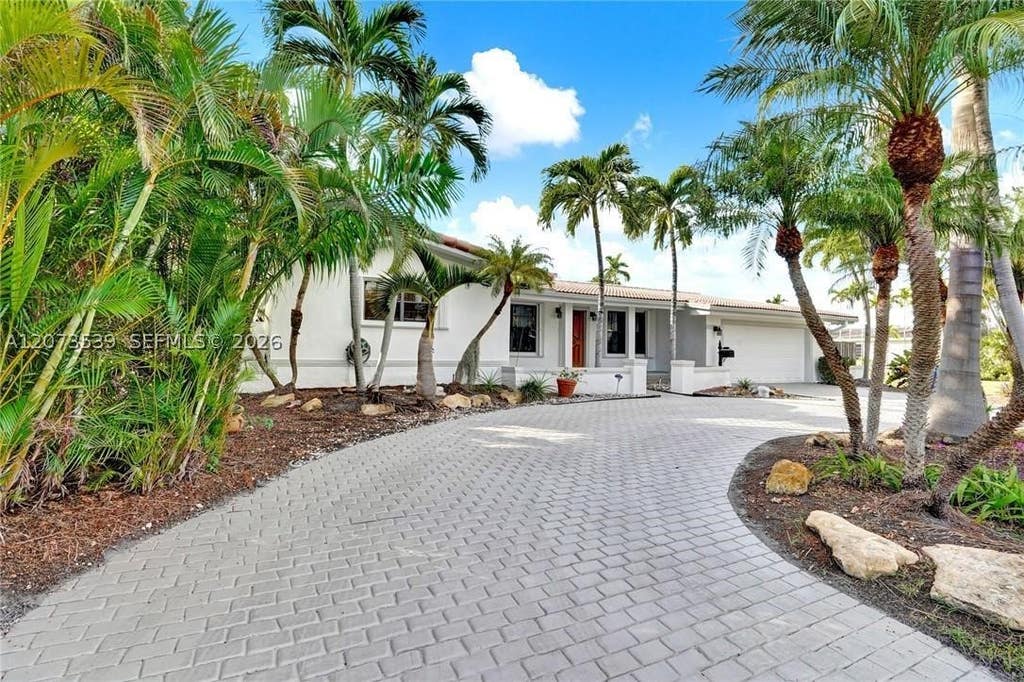 Photo of 612 Hibiscus Dr, Hallandale Beach, FL 33009 (MLS # A12073539)