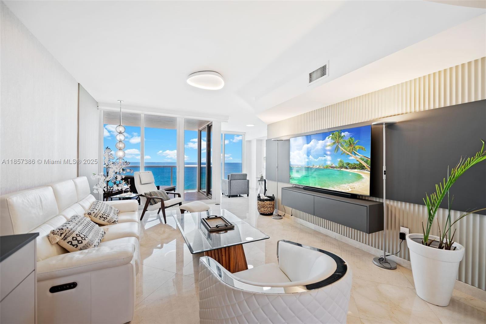 Modern. Chic. Oceanfront unit at Ocean Two, a 1,900 sq ft stunner with private elevator entry and jaw-dropping ocean & bay views. Completely updated with a fresh, contemporary design, this 2-bed/2.5-bath features floor-to-ceiling glass, split layout, and two balconies for sunrise coffee & sunset cocktails. Five-star amenities include 500+ ft of beachfront, private cabanas, heated pool, spa, jacuzzi, tennis, fitness center, steam/sauna, kids’ play area, valet, concierge, and 24/7 security. Live where style meets the surf—your Sunny Isles dream starts here.