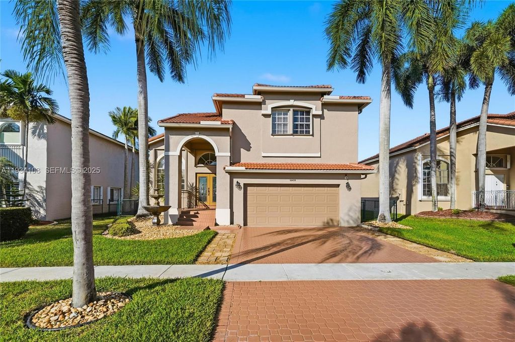 Photo of 18435 NW 10th St, Pembroke Pines, FL 33029 (MLS # A11934108)