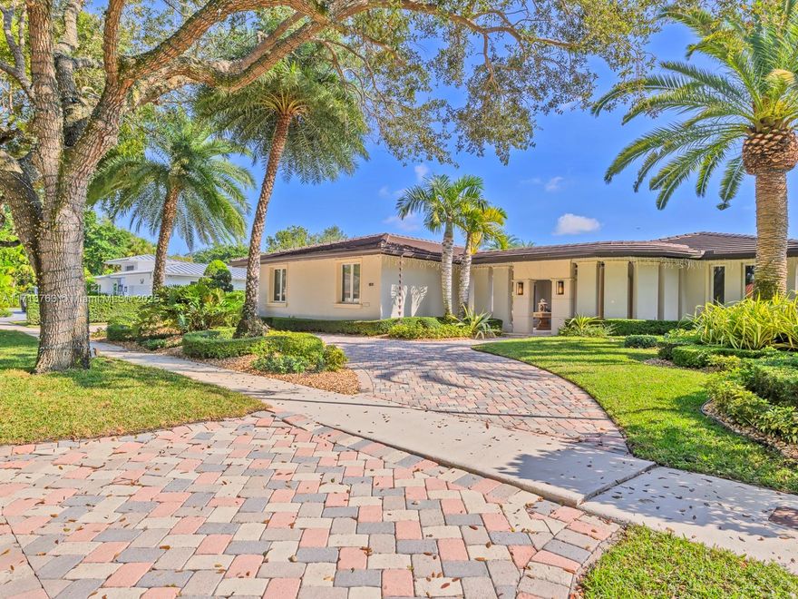 Enjoy resort-style living in this luxurious waterfront estate, nestled within Loch Lomond—the crown jewel & golf course community of Miami Lakes. Set on an oversized lakefront lot, this home boasts a bright, open floor plan with over 3,600 sf of living space. Panoramic water views greet you from every corner, and are beautifully complemented by a new gourmet kitchen with Wolf appliances and Subzero refrigerator , custom bathrooms, and a newer roof. Additional features include marble flooring throughout, a spacious billiard entertainment room w/custom built wet-bar, large circular driveway with 2-car side entry garage. Private backyard oasis offers a big outdoor kitchen pavilion, infinity pool, expansive green open spaces, and a lakefront dock with unparalleled views.