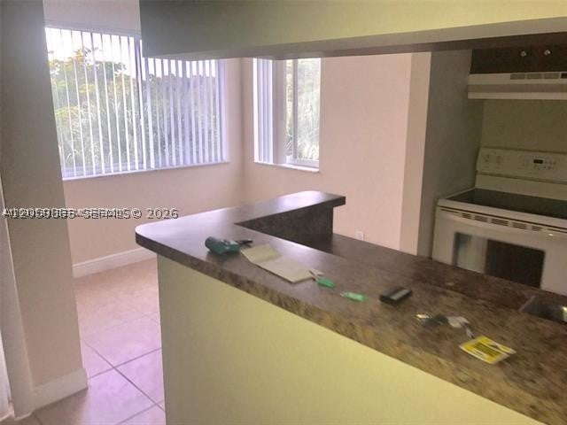 Photo of 5686 Rock Island Rd #134, Tamarac, FL 33319 (MLS # A12059883)