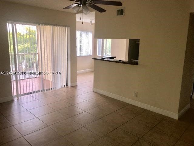 Photo of 5686 Rock Island Rd #134, Tamarac, FL 33319 (MLS # A12059883)