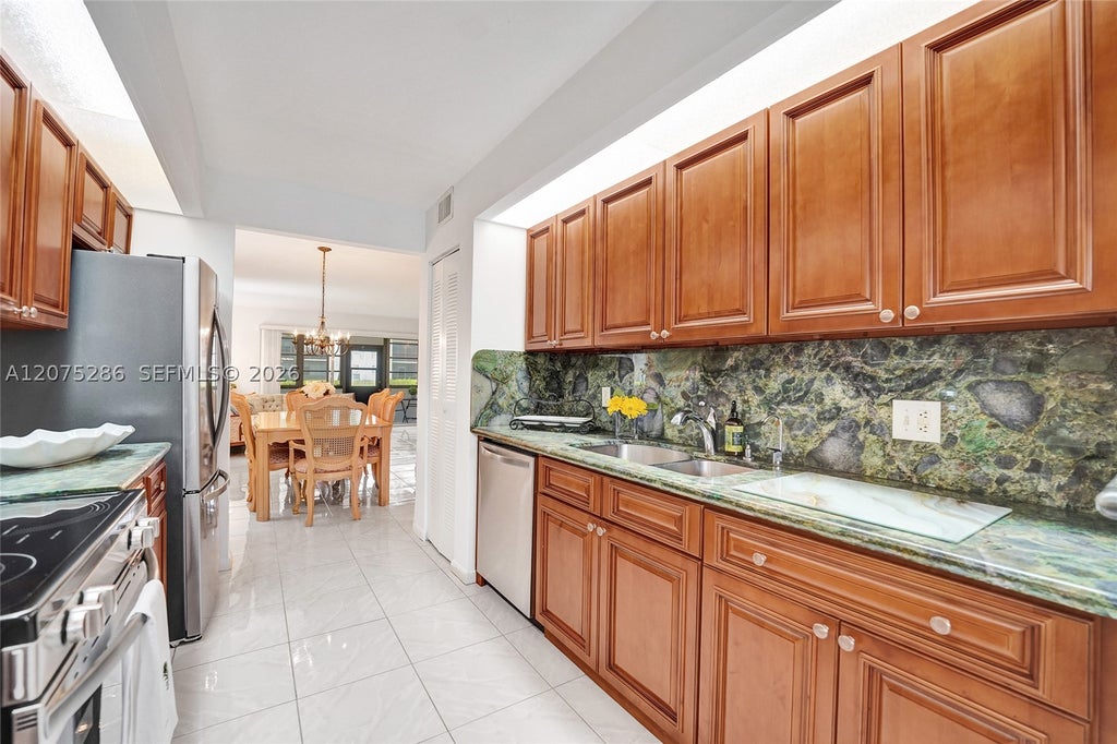 Photo of 800 SW 137th Ave #101G, Pembroke Pines, FL 33027 (MLS # A12075286)