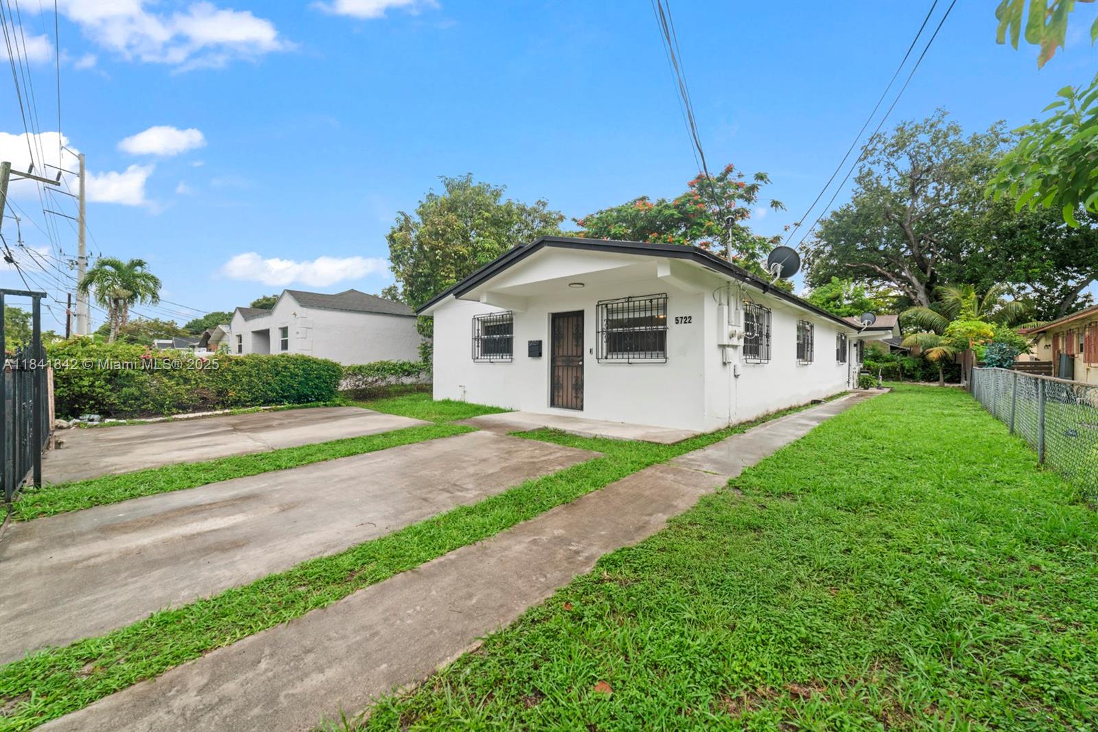 6% CAP RATE & GROWING, OPPORTUNITY ZONE, NO FLOOD ZONE. Turn-key duplex 2/1 + 2/1 generating $4,300/month in rental income, with tenants covering all utilities (electric, water, landscaping), for minimal owner expenses. Built with solid CBS block construction (1986), the property boasts an updated roof and brand-new central A/C systems (2023) in both units, plus in-unit laundry for tenant convenience. Sitting on a 6,250 SF lot east of I-95, this property is perfectly positioned for rapid appreciation and sustained rental demand. Only minutes from Wynwood, the Design District, and Midtown, it combines strong cash flow with prime location upside. An excellent investment for buyers seeking steady income today and long-term growth tomorrow. DO NOT DISTURB TENANTS