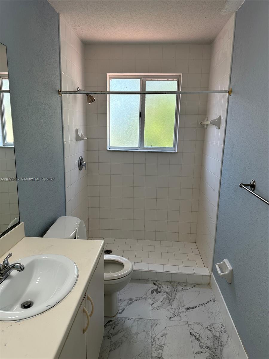TAMARAC ISLAND CONDOMINIUM - Residential Lease