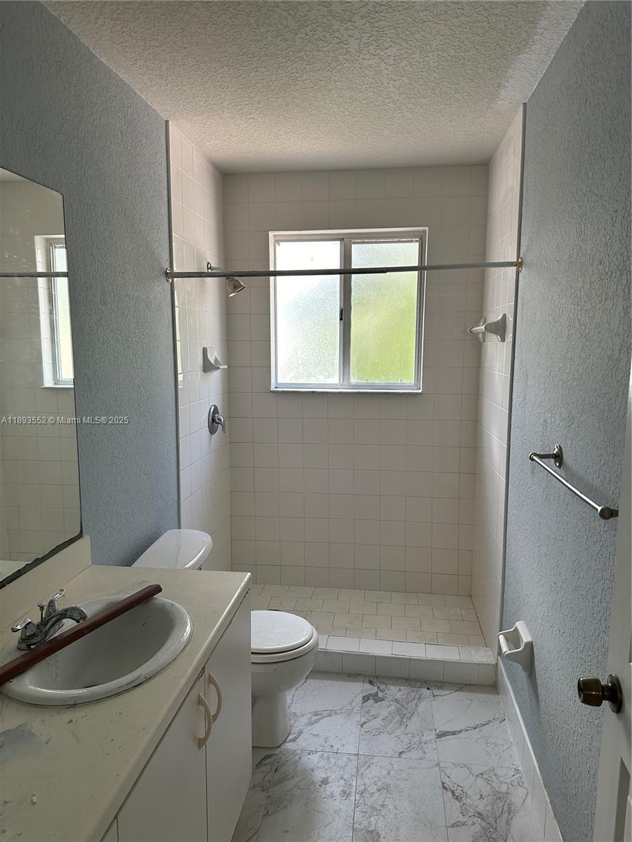 TAMARAC ISLAND CONDOMINIUM - Residential Lease