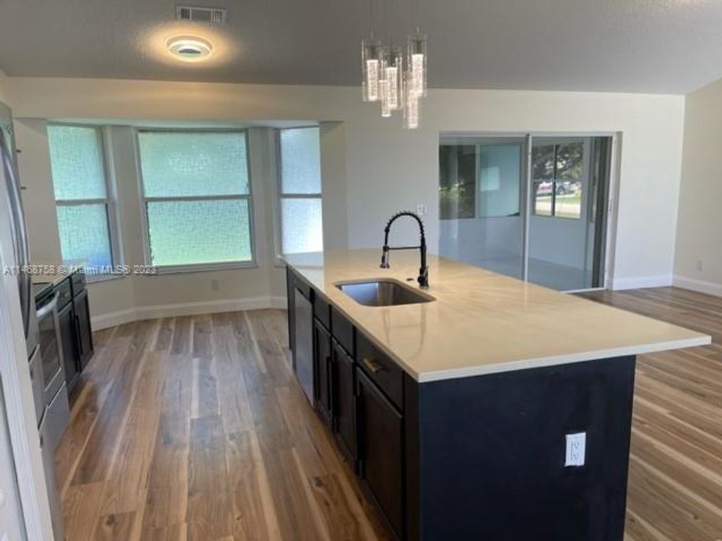 Photo of 1102 SW Irving St, Port Saint Lucie, FL 34983 (MLS # A11468758)