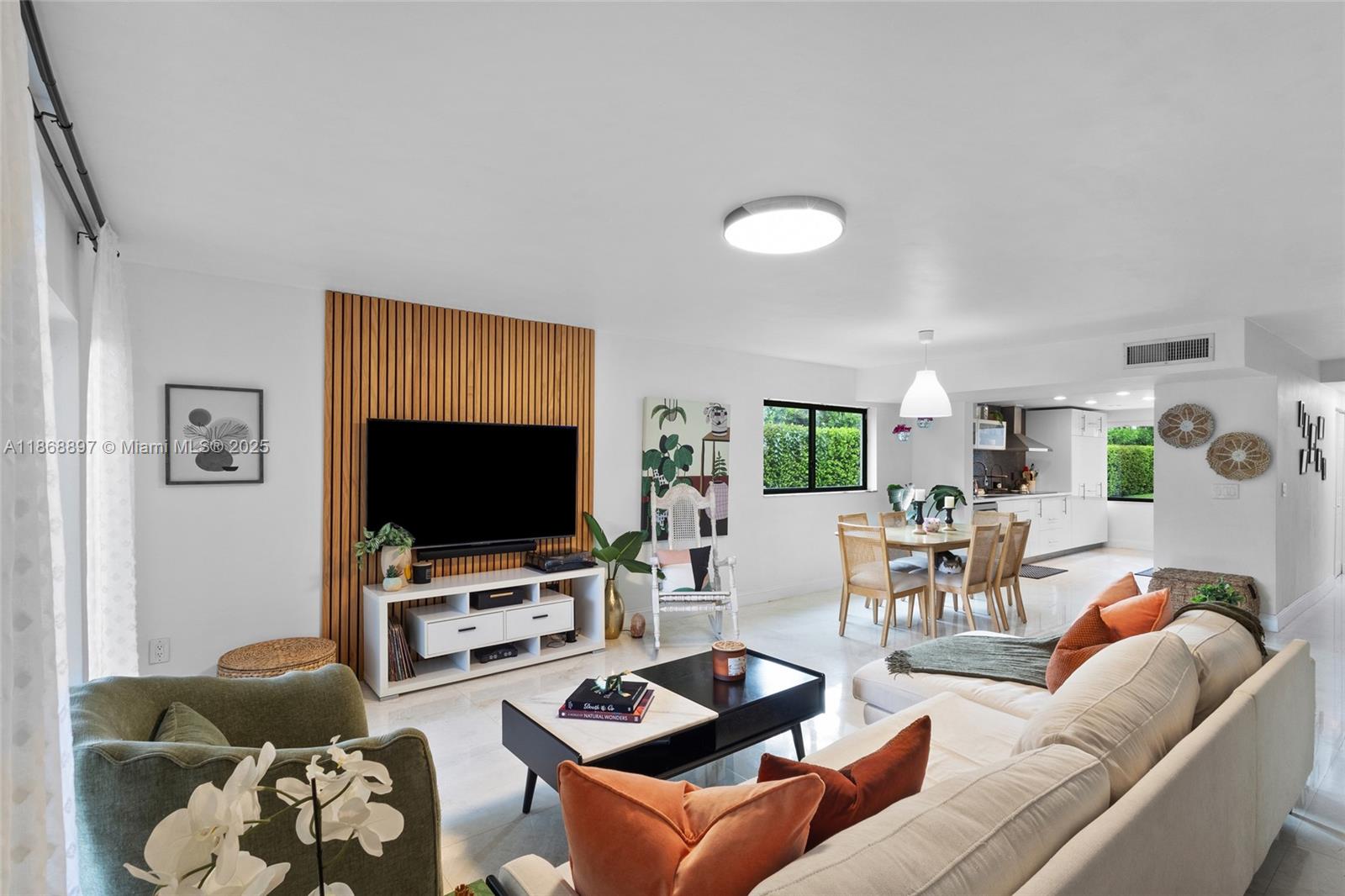 Step into this beautifully remodeled, spacious 2-story corner townhome boasting over 1,400 sq. ft. of stylish living. Perfectly positioned on the edge of the community, this residence offers rare privacy and serene golf course & lake views. Upstairs, enjoy 2 master suites, each with its own ensuite bath and private balcony, one featuring a wraparound terrace overlooking the Golf Course. Downstairs, a sleek, fully upgraded kitchen with modern finishes flows seamlessly into inviting living spaces adorned with Travertine floors. Peace of mind comes with impact windows and accordion shutters, while community amenities & reserved parking add to the lifestyle. With water included in the HOA and a location near Doral’s best dining, shopping, and 2 major expressways, this home checks every box!