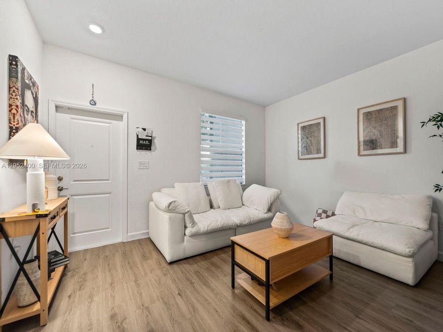 The most updated townhouse currently available in Sienna Reserve South, offering unmatched upgrades within this beautiful Homestead community. This 3 bedroom, 2.5 bathroom townhouse offers a perfect blend of style and comfort. Step inside to find sleek laminate floors throughout, all impact windows/doors, elegant glass closet doors, zebra blinds, Aromadd HVAC diffuser that add a designer touch. The home also includes a convenient in-unit washer/dryer and a covered, tiled terrace which makes it an inviting space to relax. Living room, dining room, master bedroom and terrace furniture can be included in the sale at no additional cost. The low HOA fee includes access to the clubhouse, community pool, children's playground, and exercise room. This is home is tastefully designed for relaxation and everyday living.