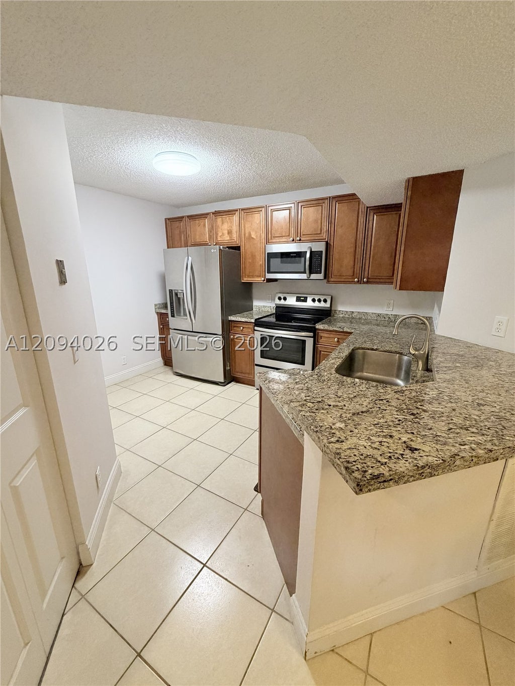 Photo of 8741 Wiles Rd #204, Coral Springs, FL 33067 (MLS # A12094026)