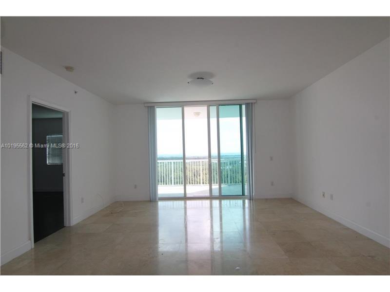 Amazing ocean, bay and State Park views from this 21st floor. Dark wooden floors throughout unit. Two full bathrooms and guest bathroom. Stainless steel appliances and granite counter tops. 24/7 security. Excellent location provides easy access to Beach, schools, FIU, TARGET, COSTCO, PUBLIX and shopping. Unit is ready for move in. EZ to show lock box