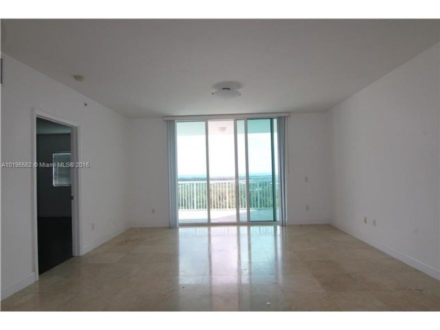 Amazing ocean, bay and State Park views from this 21st floor. Dark wooden floors throughout unit. Two full bathrooms and guest bathroom. Stainless steel appliances and granite counter tops. 24/7 security. Excellent location provides easy access to Beach, schools, FIU, TARGET, COSTCO, PUBLIX and shopping. Unit is ready for move in. EZ to show lock box
