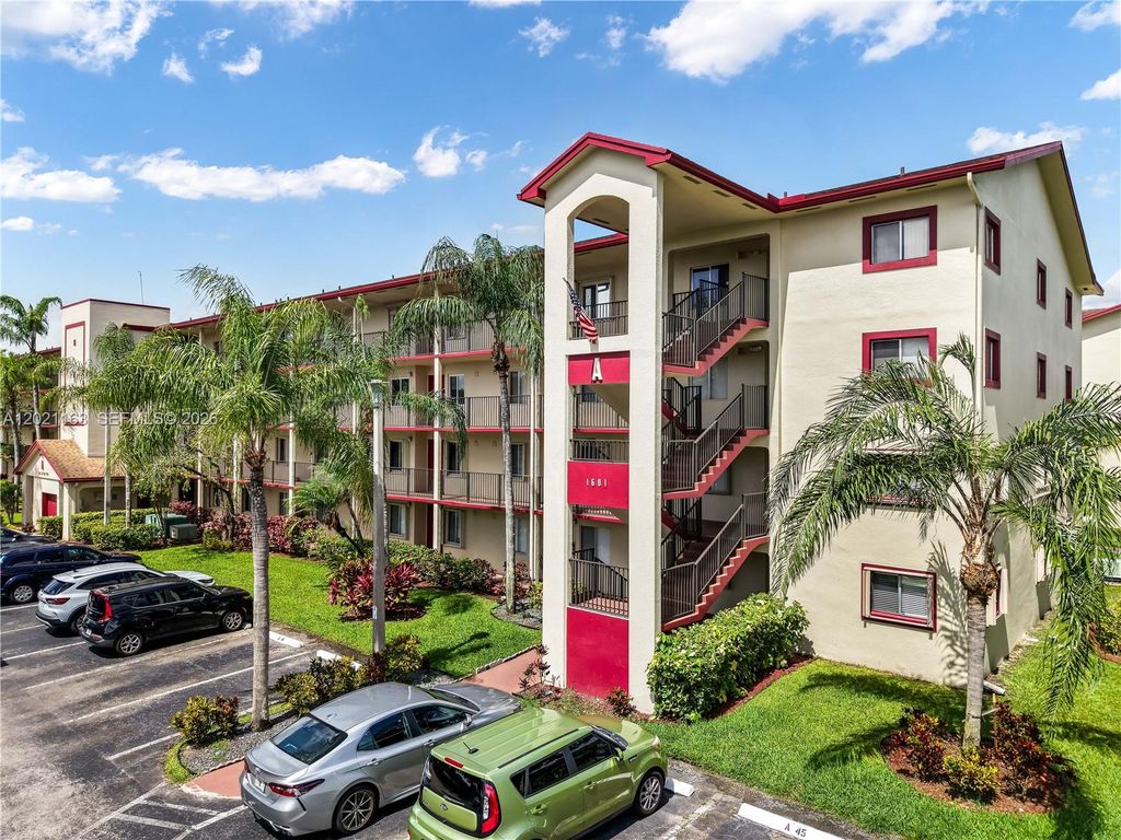 Photo of 1601 SW 128th Ter #112A, Pembroke Pines, FL 33027 (MLS # A12021163)