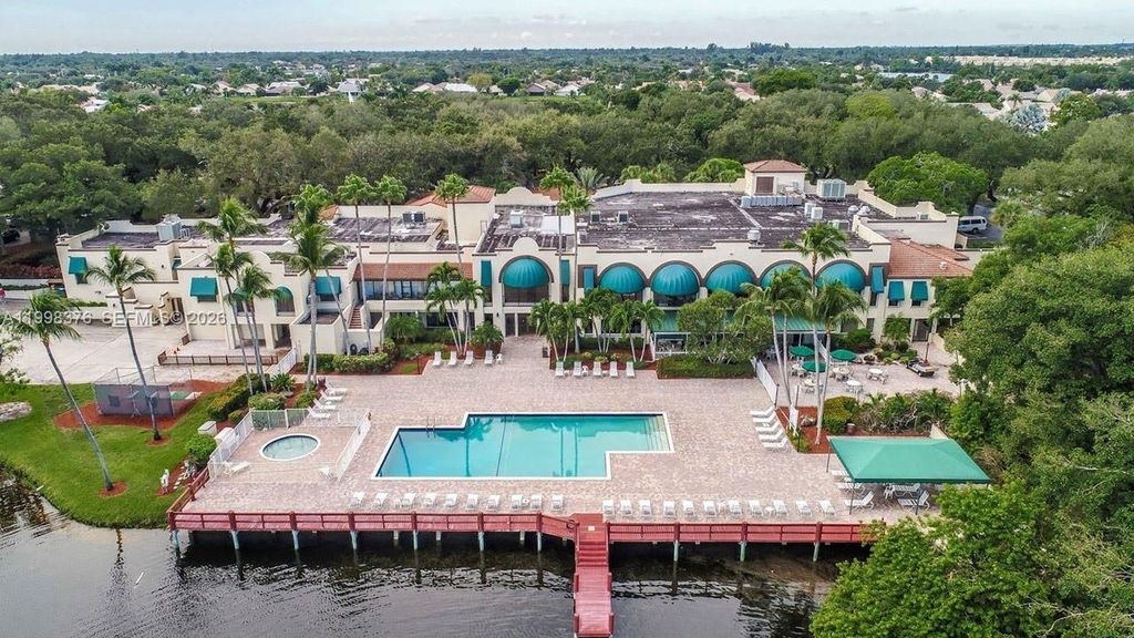 Photo of 9460 Tangerine Pl #404, Davie, FL 33324 (MLS # A11998376)