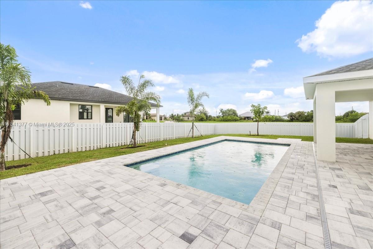 $20,000 BUILDER PAID CLOSING COSTS! NEW CONSTRUCTION POOL HOME WITH A PRIVACY FENCE! Live the Sunlife home featuring TWO PRIMARY SUITES both with full bath and walk in closet! NO FLOOD ZONE + IMPACT WINDOWS = LOW INSURANCE. Home includes 4 bedrooms, 3 full bathrooms - INCLUDING A POOL BATH! The open floor plan seamlessly connects to the huge screened lanai, paver patio and SPARKLING HEATED POOL! The modern kitchen features stainless steel appliances, all wood cabinets with soft close doors, quarts counter tops, a large island with breakfast bar and a pantry! Wide open living spaces featuring vaulted ceilings and luxury hard surface flooring throughout! Ceiling fans in every bedroom! This is The Tidewater Plan