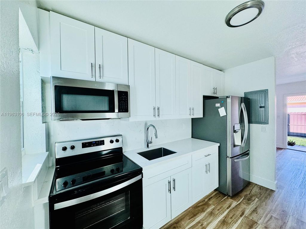 Photo of 609 NW 2nd Ave #1, Hallandale Beach, FL 33009 (MLS # A11983106)