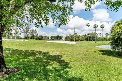 Photo of 9520 S Hollybrook Lake Dr #205, Pembroke Pines, FL 33025 (MLS # A11879786)