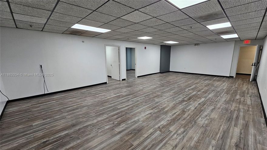 This 925 square foot office space is uniquely located in a 115,310 square foot 2-story property with a church on the 1st floor and dedicated office space on the 2nd. Office suite is has an area that can be used as a lobby or reception area, a second area that could be used as private office space, and a larger open area that could be used as a conference room or classroom. Office space is ideal for creative businesses, start ups, and non-profit organizations. The building is conveniently on US441 with access to major routes, this building offers 700+ parking spaces, free visitor parking, on-site management, maintenance, security, and a café. Elevate your venture in this strategic, well-appointed space. Multiple office spaces are available.