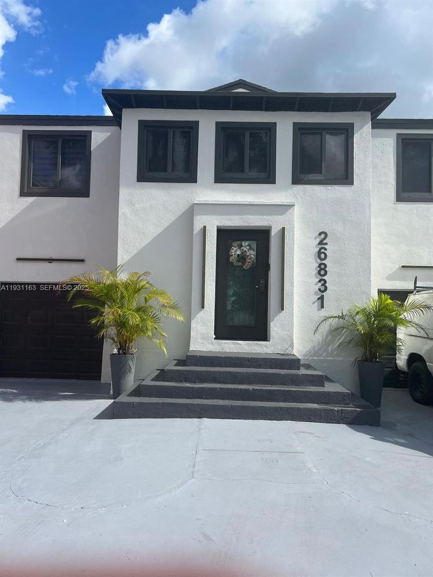 Beautifully remodeled two-story property offering two independent units under one roof. Ideal for multigenerational living or owner-occupant seeking rental income. Completely updated with modern design, new systems, new Aluminum Roof, Impact Doors and Windows, move in ready condition. Huge back Yard. Must See!
Two Master Bedrooms and Master Bath. Great for Entertainment with Pergola, BBQ Many extras.