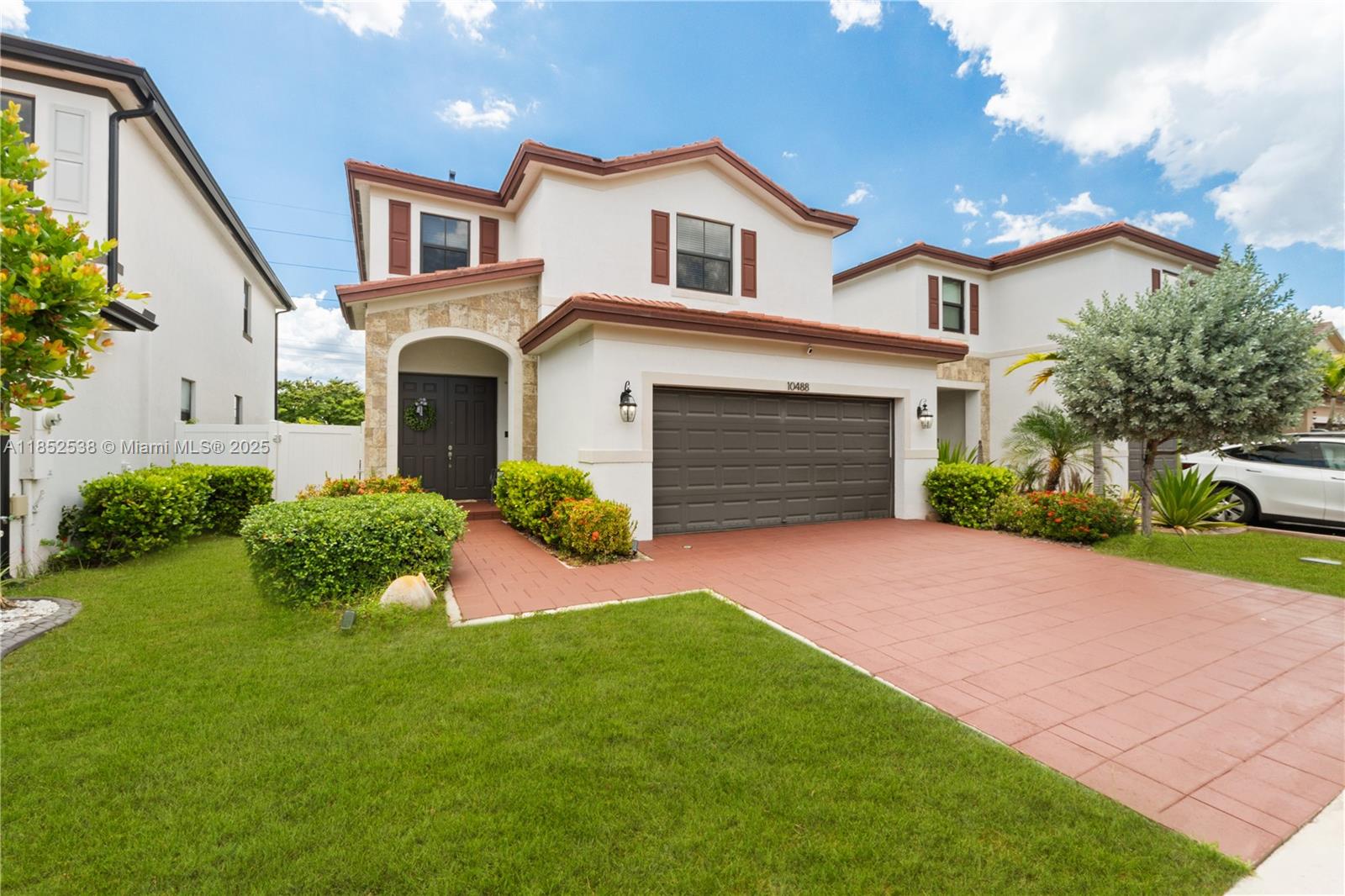 Welcome to your next chapter in Aquabella—a gated community known for its resort-style living. This two-story, 3-bedroom, 2.5-bath home features brand new laminate floors upstairs, a freshly painted driveway, and a thoughtfully updated kitchen with quartz waterfall counters and stainless steel appliances. Custom zebra shades bring a modern flair to the main living area, while all bedrooms and laundry are conveniently located upstairs. The primary suite offers privacy, and the Jack-and-Jill bath connects the two guest rooms. Enjoy community perks like multiple pools, hot tubs, gyms, and a stylish clubhouse perfect for entertaining.