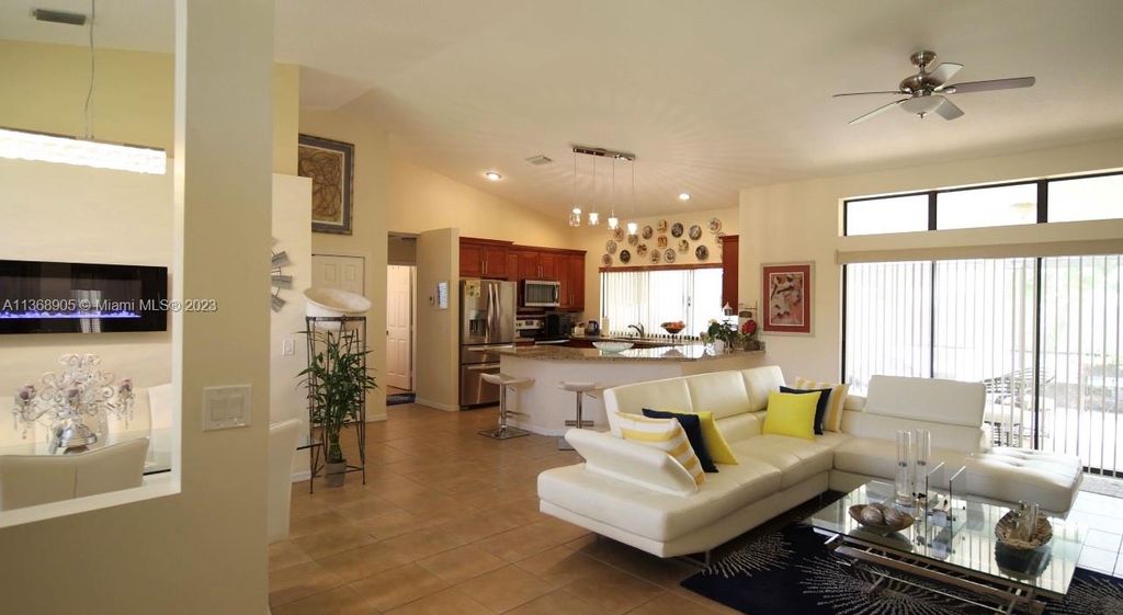 Photo of 1632 SE Grapeland Ave, Port Saint Lucie, FL 34952 (MLS # A11368905)