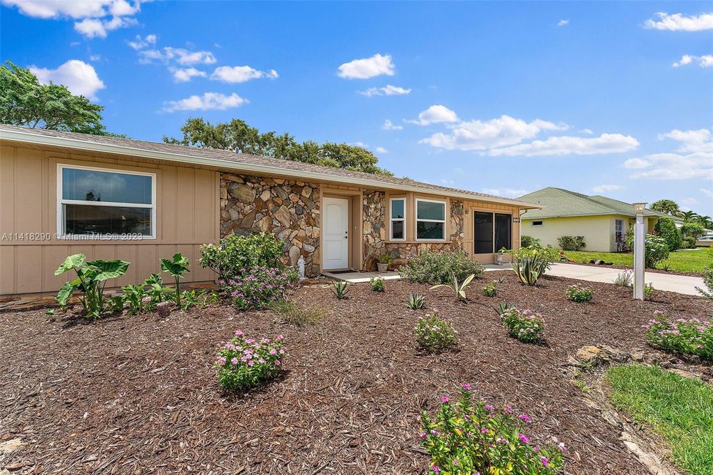 Photo of 1966 SE Benedictine St, Port Saint Lucie, FL 34983 (MLS # A11418290)