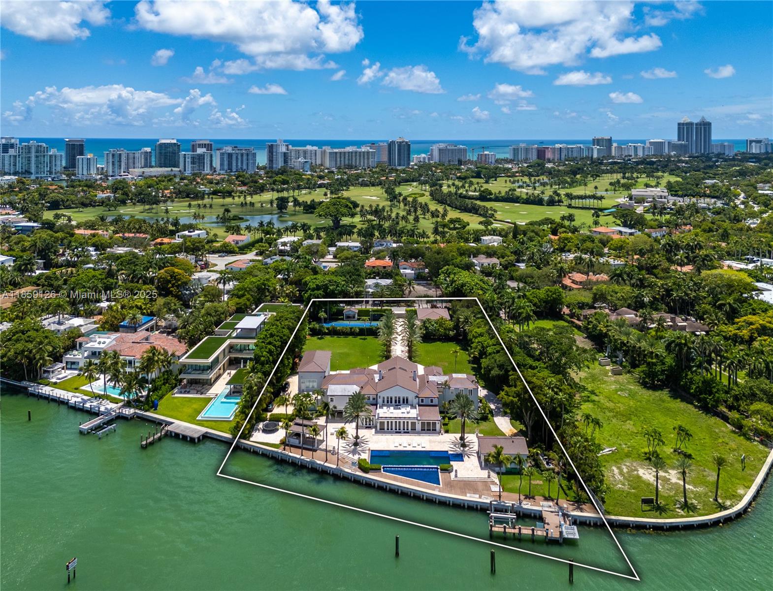 The largest and most valuable waterfront estate in Miami Beach - a landmark property on Billionaire’s Row, North Bay Road, that embodies prestige, privacy, and the pinnacle of luxury living! Sited on 2.3 acres with 290-ft of waterfrontage, this gated, 22,000-sf mansion is designed for grand entertaining while enjoying panoramic water views. Indulgent amenities include a dock, 8-car garage, indoor racquetball court, tennis court, gym, and incredible backyard. A dramatic entry foyer with double-curved grand staircase with ornate ironwork welcomes you inside this timeless home featuring high ceilings, theater, billiard room, entertainment bar, and primary suite crowned with domed ceilings. Estate-style driveway and manicured grounds offer enduring sophistication. For lease furnished, $495K/M
