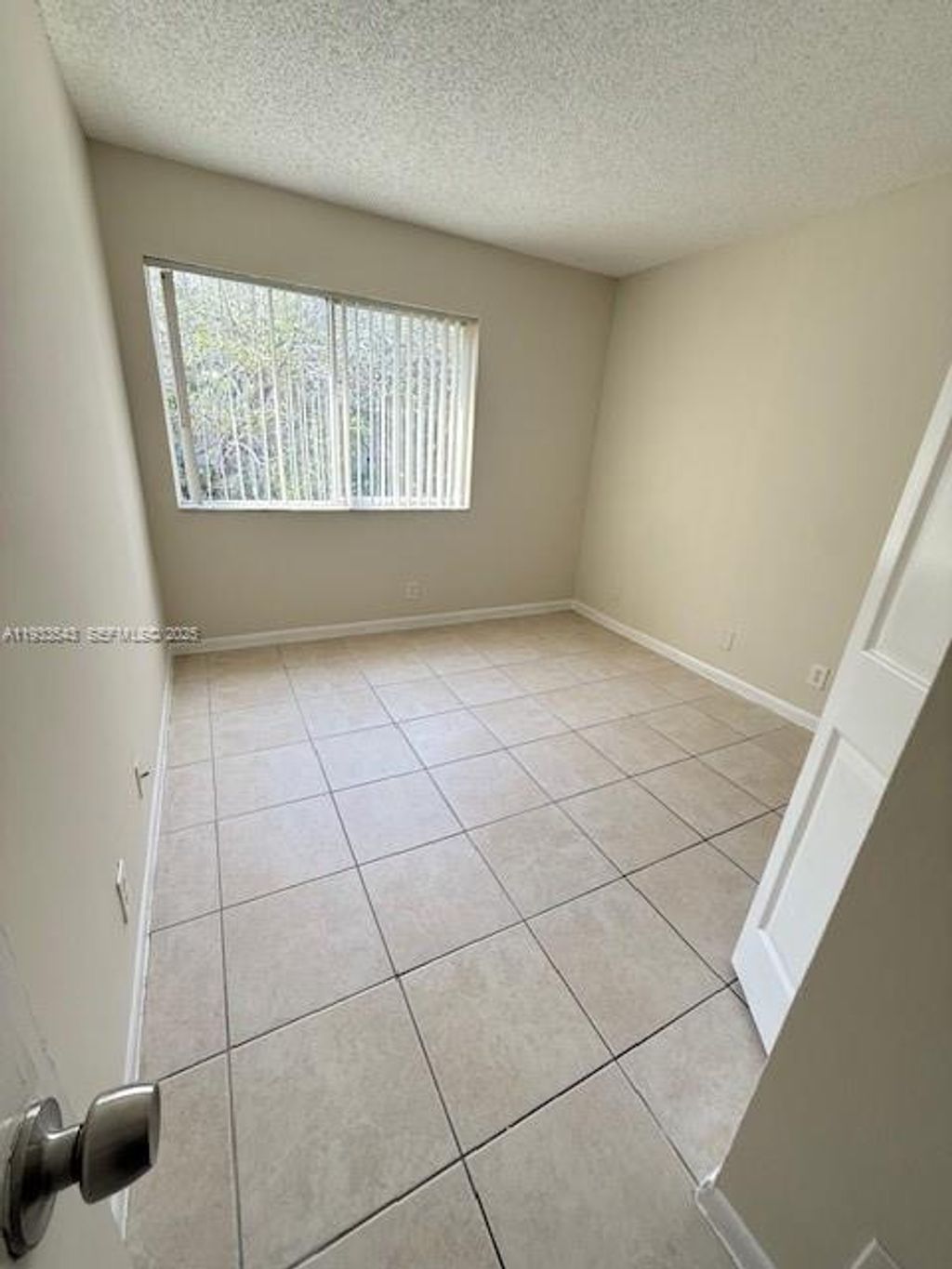 Photo of 10773 Cleary Blvd #201, Plantation, FL 33324 (MLS # A11933543)
