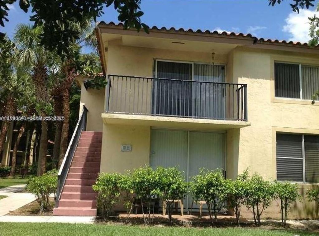 Photo of 10773 Cleary Blvd #201, Plantation, FL 33324 (MLS # A11933543)
