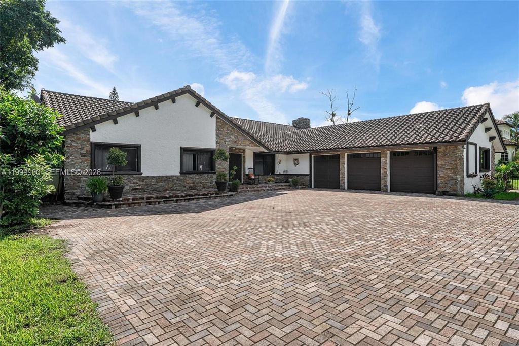 Photo of 6252 NW 65th Ter, Parkland, FL 33067 (MLS # A11999900)