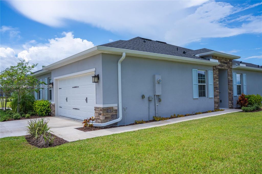 Photo of 9454 SW Libertas Way, Port St Lucie, FL 34987 (MLS # A11860376)